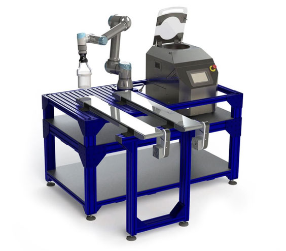 Specialty and Custom FlackTek with bottle atop robotic machine.